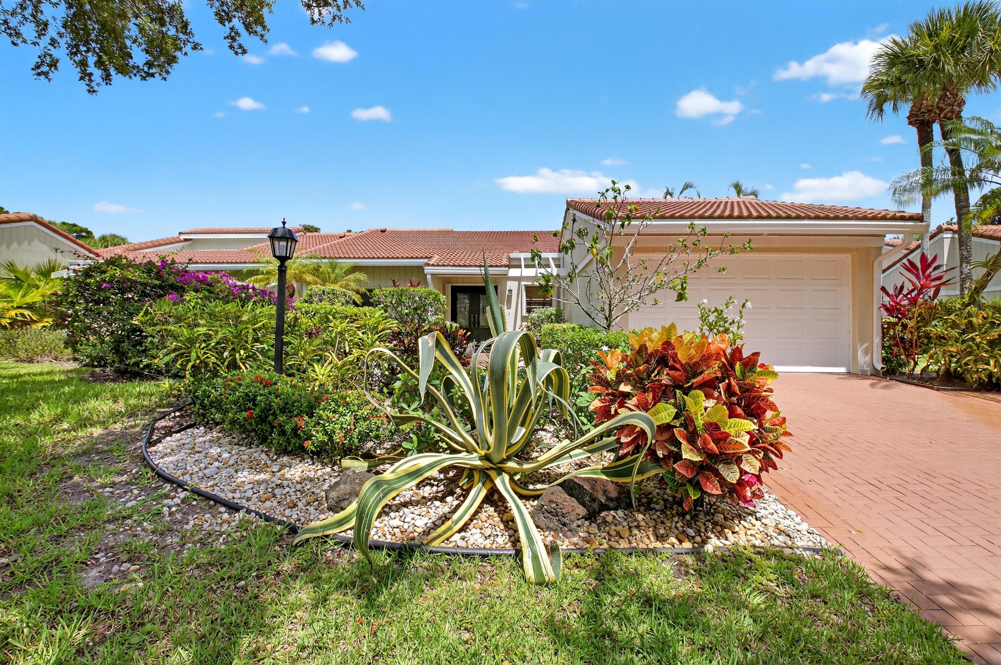 Welcome to 37 Glens Drive W, a beautifully maintained 2-bedroom, 2-bath villa located in the heart of the prestigious Hunters Run Country Club. This spacious home offers a light-filled, open-concept layout with tranquil golf course views and a seamless indoor-outdoor flow. The large living and dining areas open to a screened lanai, perfect for relaxing or entertaining year-round.The eat-in kitchen features ample storage and counter space, while the generously sized primary suite includes a walk-in closet and en-suite bath with dual vanities. A split-bedroom floor plan offers privacy and flexibility, ideal for guests or a home office.2 Bedrooms with convertible 3rd bedroom. PLUS - Separate Office Space Addition