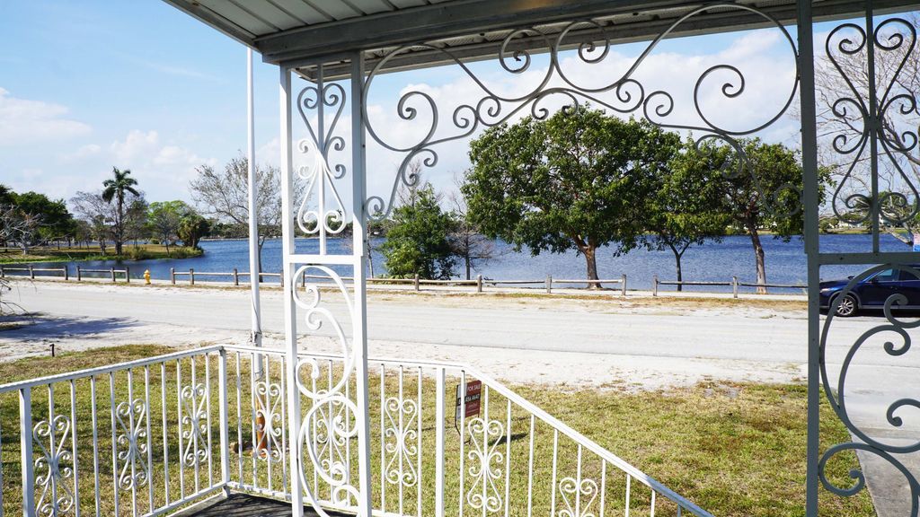 Photo of 5160 Lake Osborne Drive, Lake Worth Beach, FL 33461 (MLS # R11165277)