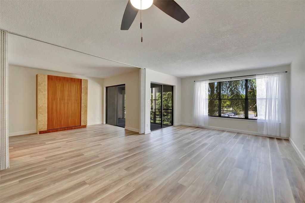 Photo of 2311 S Cypress Bend Drive #318A, Pompano Beach, FL 33069 (MLS # F10399603)