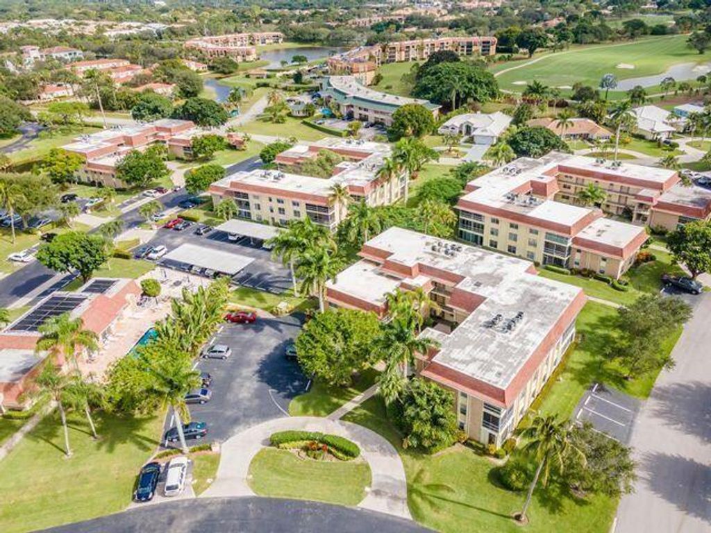 Photo of 5510 Tamberlane Circle #147, Palm Beach Gardens, FL 33418 (MLS # R10845214)