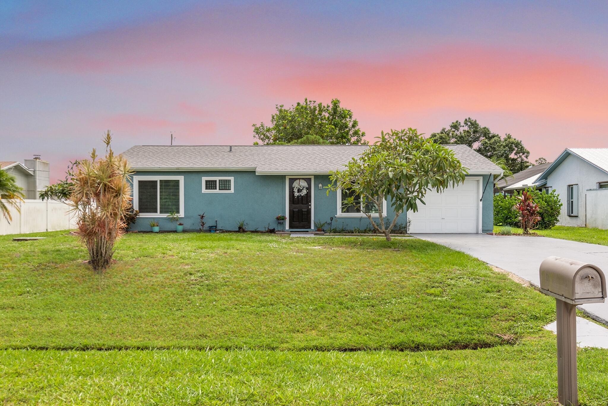 NO HOA! NEW ROOF! IMPACT WINDOWS! Welcome to this beautifully recently upgraded 2 bed, 1.5 bath home in the heart of Port St. Lucie! The kitchen features granite countertops, soft-close cabinets, a stylish backsplash, and breakfast bar. Recent updates include a brand new roof, impact windows, accordian shutter for the sliding door, new impact garage door, updated light fixtures, ceiling fans, and modern switches throughout. Step outside to a private backyard oasis with a white vinyl privacy fence, accordion shutters on the slider, and a storage shed for extra space. This home offers comfort, style, and peace of mind, perfect for everyday living or a smart investment. Move-in ready and conveniently located near Crosstown, US1, I-95, and everything else Port St. Lucie has to offer!