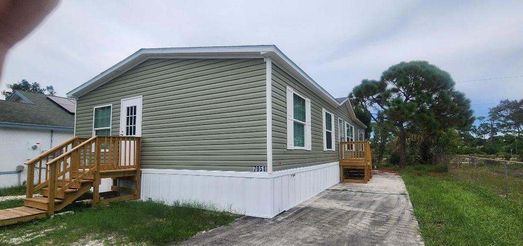 Photo of 7951 SE Skylark Avenue, Hobe Sound, FL 33455 (MLS # R11122410)