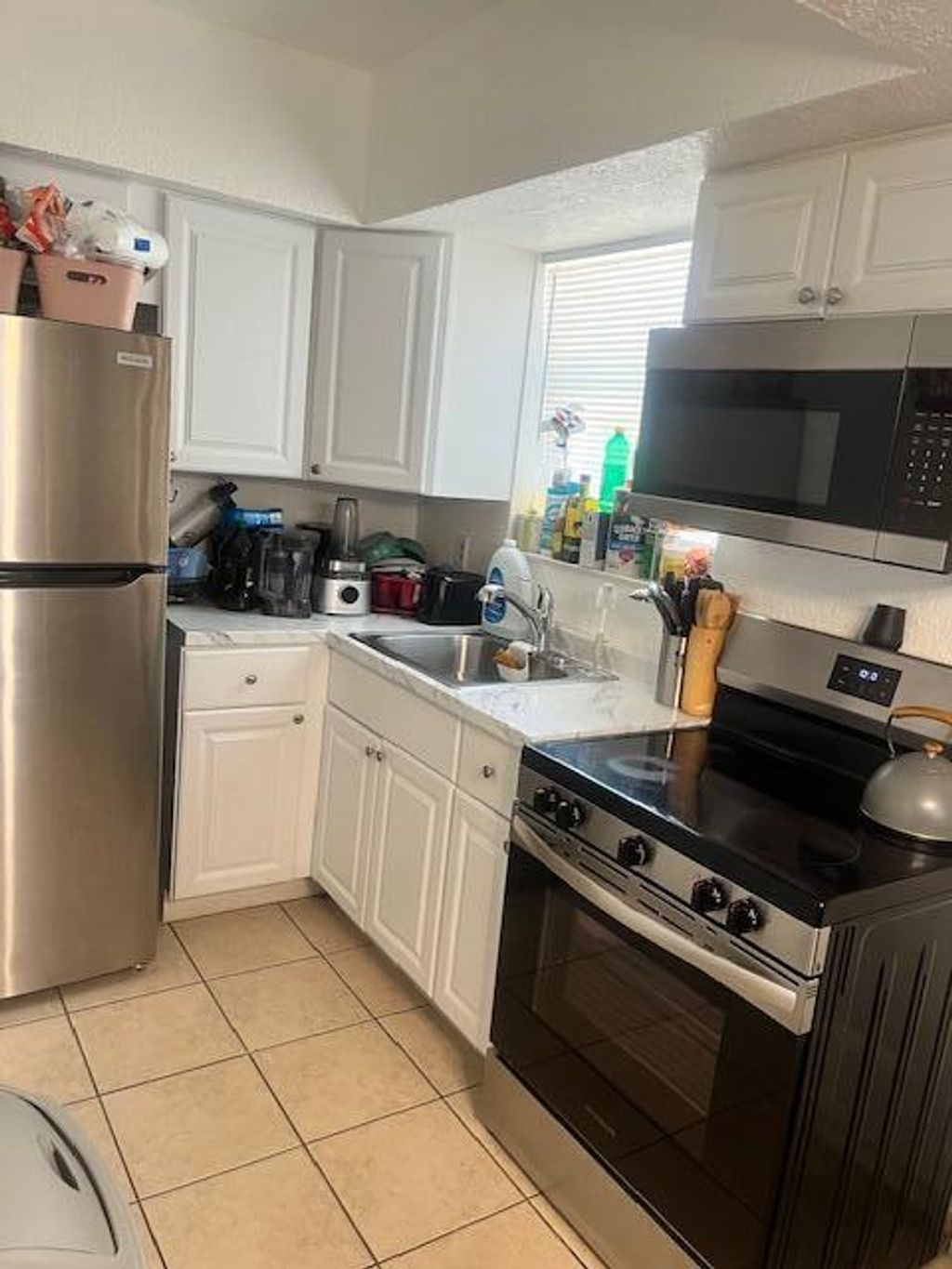 Photo of 390 NE 42nd Court #A-b, Oakland Park, FL 33334 (MLS # B26001264)