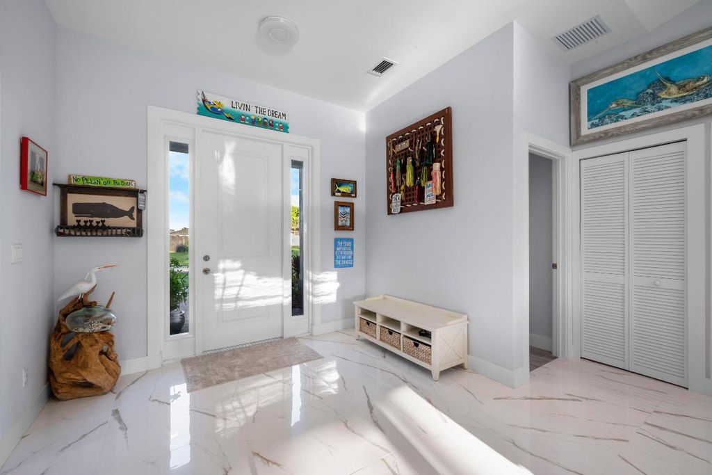 Photo of 4583 SW Bradbury Street, Port Saint Lucie, FL 34953 (MLS # R11127749)