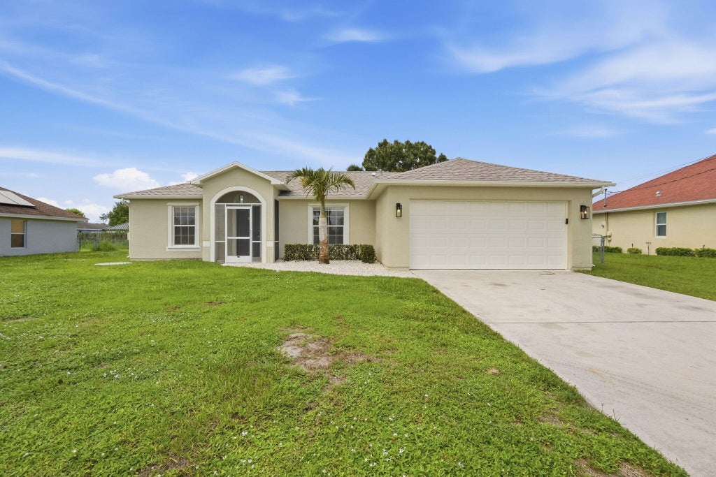 Photo of 453 SW COLUMBUS Drive, Port Saint Lucie, FL 34953 (MLS # B26081639)