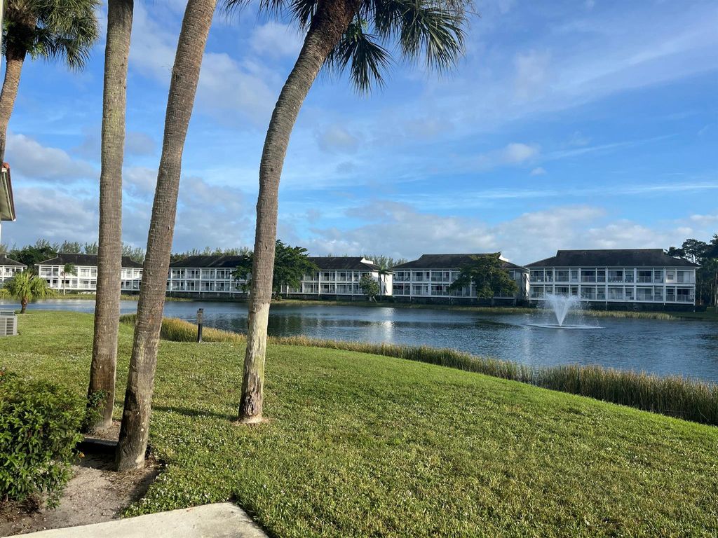 Photo of 126 Cypress Point Drive, Palm Beach Gardens, FL 33418 (MLS # R11140016)