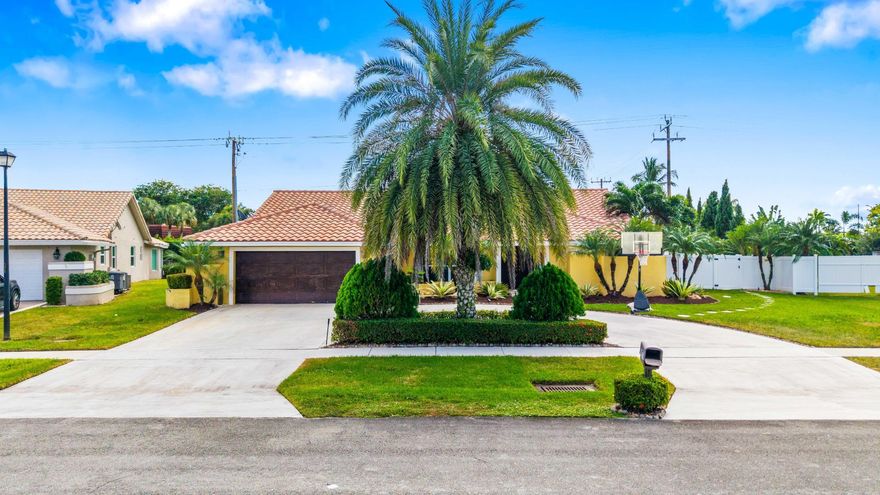 Greetings to your dream home in the highly desirable Boca Rio Heights neighborhood. This beautifully updated residence offers soaring ceilings, stunning tile flooring throughout the main living areas, and warm hardwood floors in the bedrooms. The gourmet kitchen features stainless steel appliances, granite countertops, and a continuous flow into the bright breakfast nook and adjoining family room, ideal for everyday living and entertaining. The home features a split bedroom layout for privacy, two HVAC units for efficient climate control, a private backyard oasis with a heated pool and Jacuzzi, an enchanting LED lighting system, and a fenced yard, providing a serene refuge.  Additional features include Solar panels, Sonos and Boss whole-house audio system, a central vacuum, and a home generator. Super low HOA. Don't miss this outstanding opportunity.