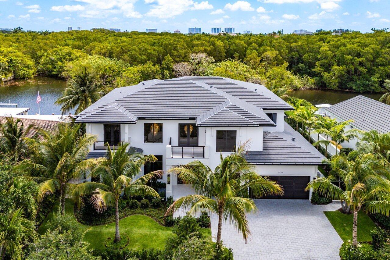 Spectacular New Construction Waterfront Estate Overlooking the El Rio Canal & Preserve Area, Five En-Suite Bedrooms, 2nd Floor Club Room w/ Half Bath, 93' of Waterfront with New Seawall & 73' Composite Three Tier Dock, Whole House Generator, 550+ Bottle Wine Room, Sub-Zero Appliances, Wolf 6 Burner Range w/ Griddle, Navien Tankless Gas H/W, Sparkling Heated Saltwater Pool w/ Sun-shelf and Spillover Spa, Oversized 3 Car Garage, 40' Ceiling Great Room, Aqua Fire Vapor Fireplace, Amazing Primary Suite w/ Double Vanities, Water Closets, Dual Showers & Soaking Tub, Synthetic Turf Backyard, Creston Automation, Lennox A/Cs, Sonos Sound System, Oversized 2nd Floor Entertaining Balcony, Turnkey Property, Exceptional Upgrades throughout, Great Public Schools, Close to Everything