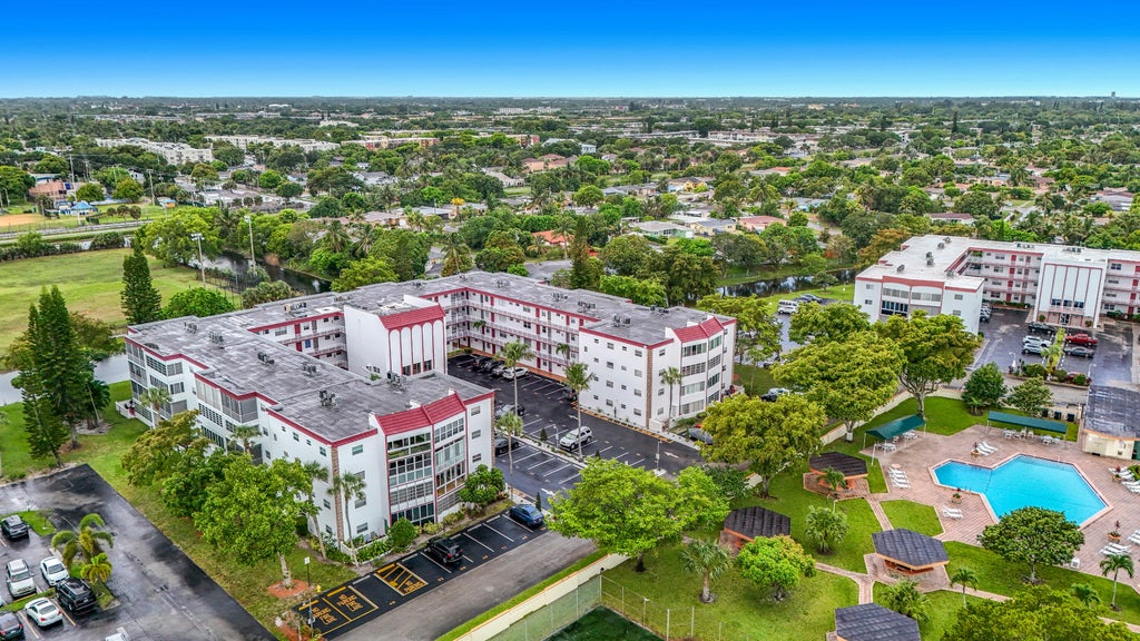 Photo of 4270 NW 40th Street #401, Lauderdale Lakes, FL 33319 (MLS # B26040857)