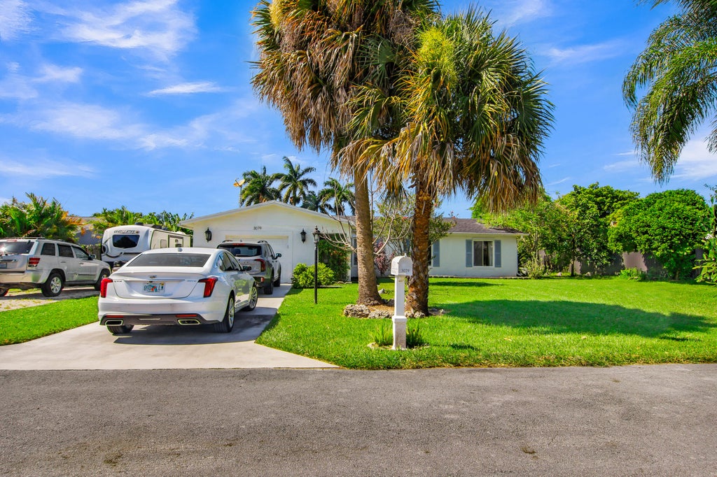 Photo of 3079 Indian Trail, Lake Worth, FL 33462 (MLS # B26052738)