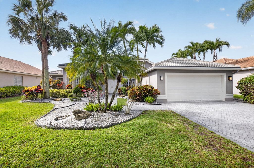 Photo of 7528 Tarpon Cove Circle, Lake Worth, FL 33467 (MLS # B26019563)