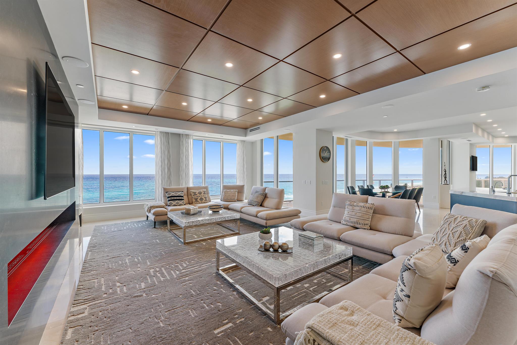 2700 N Ocean Drive. Singer Island - Ritz Carlton Residences-Palm BeachRarely available Ritz Carlton Tower Suite on Singer Island. The 7445 sf Ocean front condo is fully renovated with the highest grade materials throughout. Lutron blinds, sheer and blackout. Custom cabinetry in office and kitchen. Custom 3'' Cristallo marble countertops. A water vapor changeable color fireplace built into a 9 x14 ft marble walled structure. Custom petrified wood stone wall wet bar. Custom bathrooms and finishes throughout. Wood ceiling beams and custom designer wall structures. LED throughout. Kitchen countertops with cristallo, sandalus and leathered quartzite. This beyond fabulous unit opens up into its own foyer has 11ft ceilings ocean and intracoastal views 4 bedrooms 2 additional office