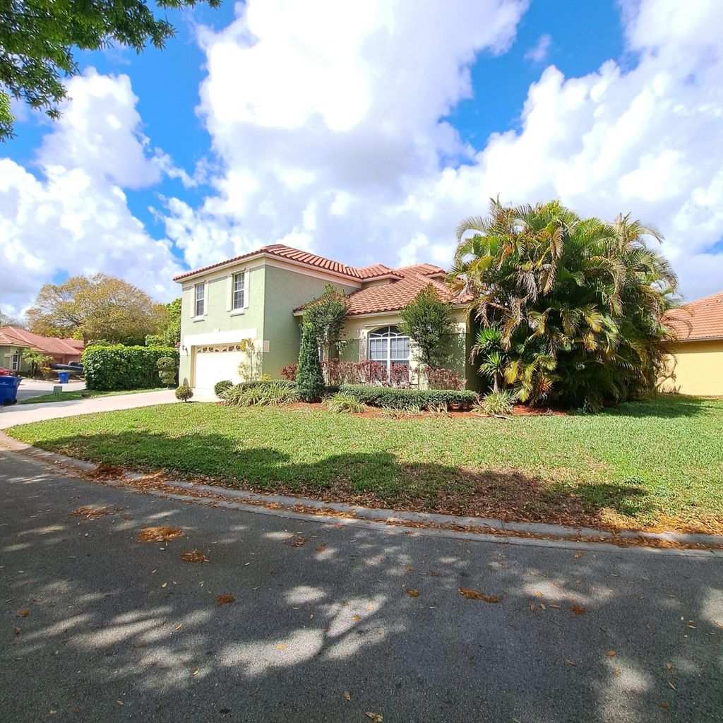 Photo of 7021 Galleon Cove, Riviera Beach, FL 33418 (MLS # R11164262)