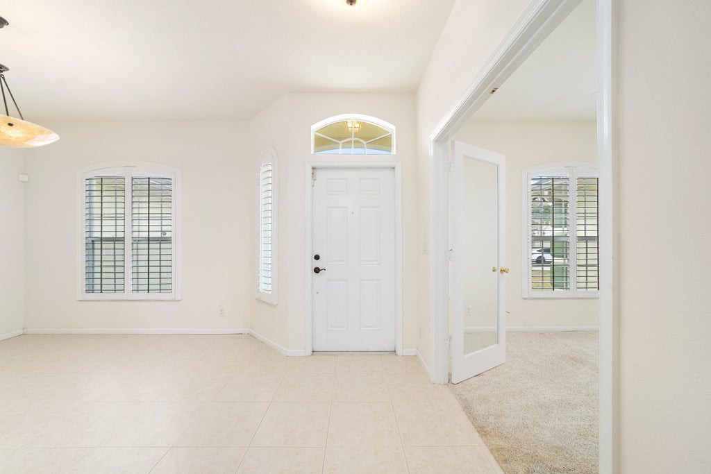 Photo of 831 SW Idol Avenue, Port Saint Lucie, FL 34953 (MLS # R10979278)