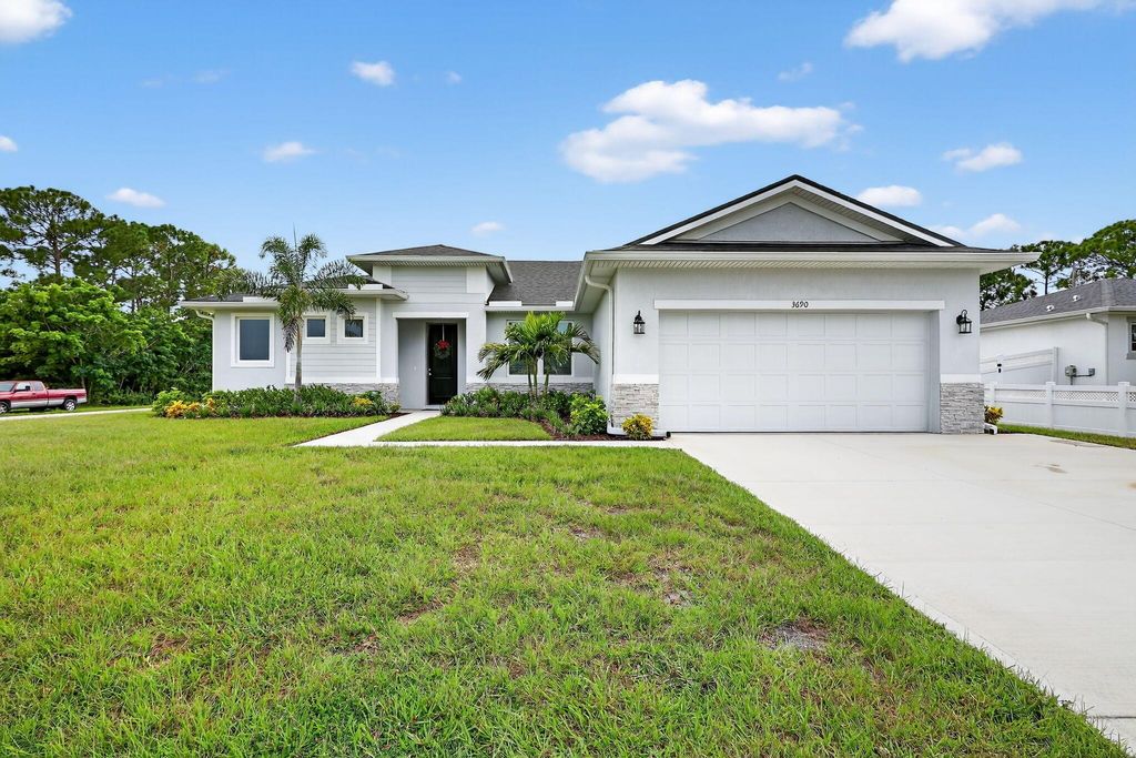 Photo of 3690 SW Margela Street, Port Saint Lucie, FL 34953 (MLS # R11118235)