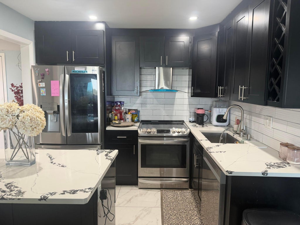Photo of 4174 INVERRARY Drive #1010, Lauderhill, FL 33319 (MLS # B26060745)