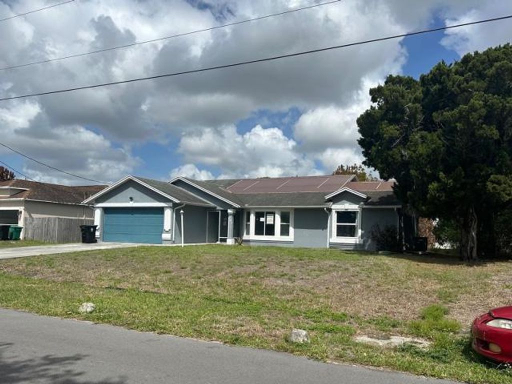 Photo of 751 SW Monsoon Road, Port Saint Lucie, FL 34953 (MLS # B26015896)