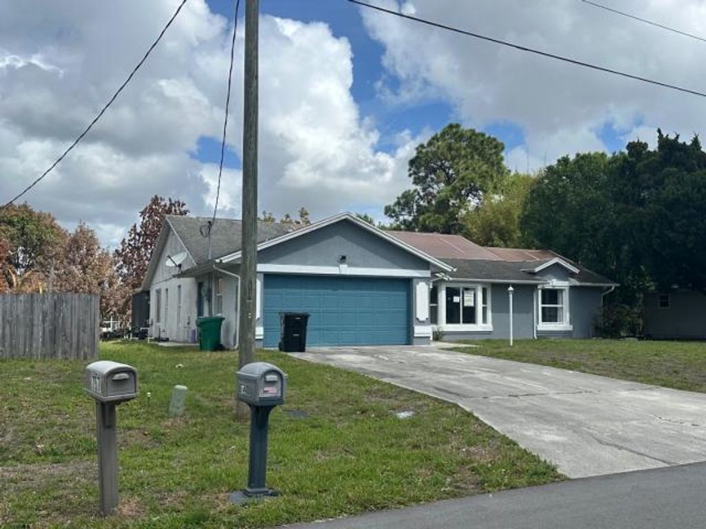 Photo of 751 SW Monsoon Road, Port Saint Lucie, FL 34953 (MLS # B26015896)