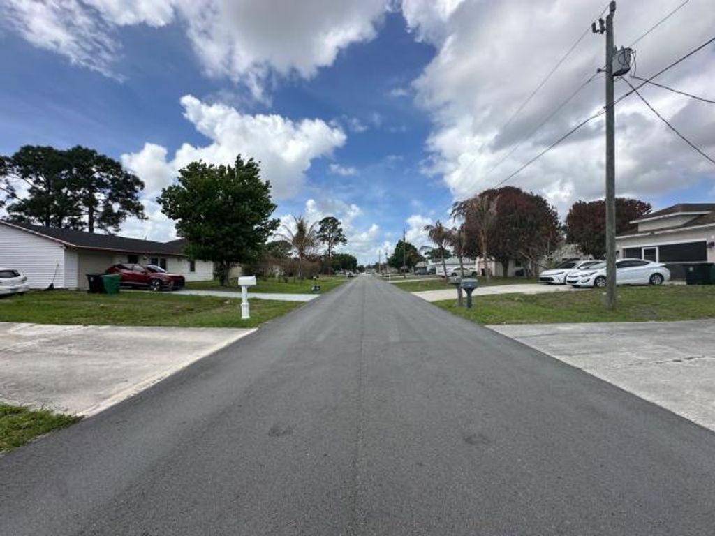 Photo of 751 SW Monsoon Road, Port Saint Lucie, FL 34953 (MLS # B26015896)
