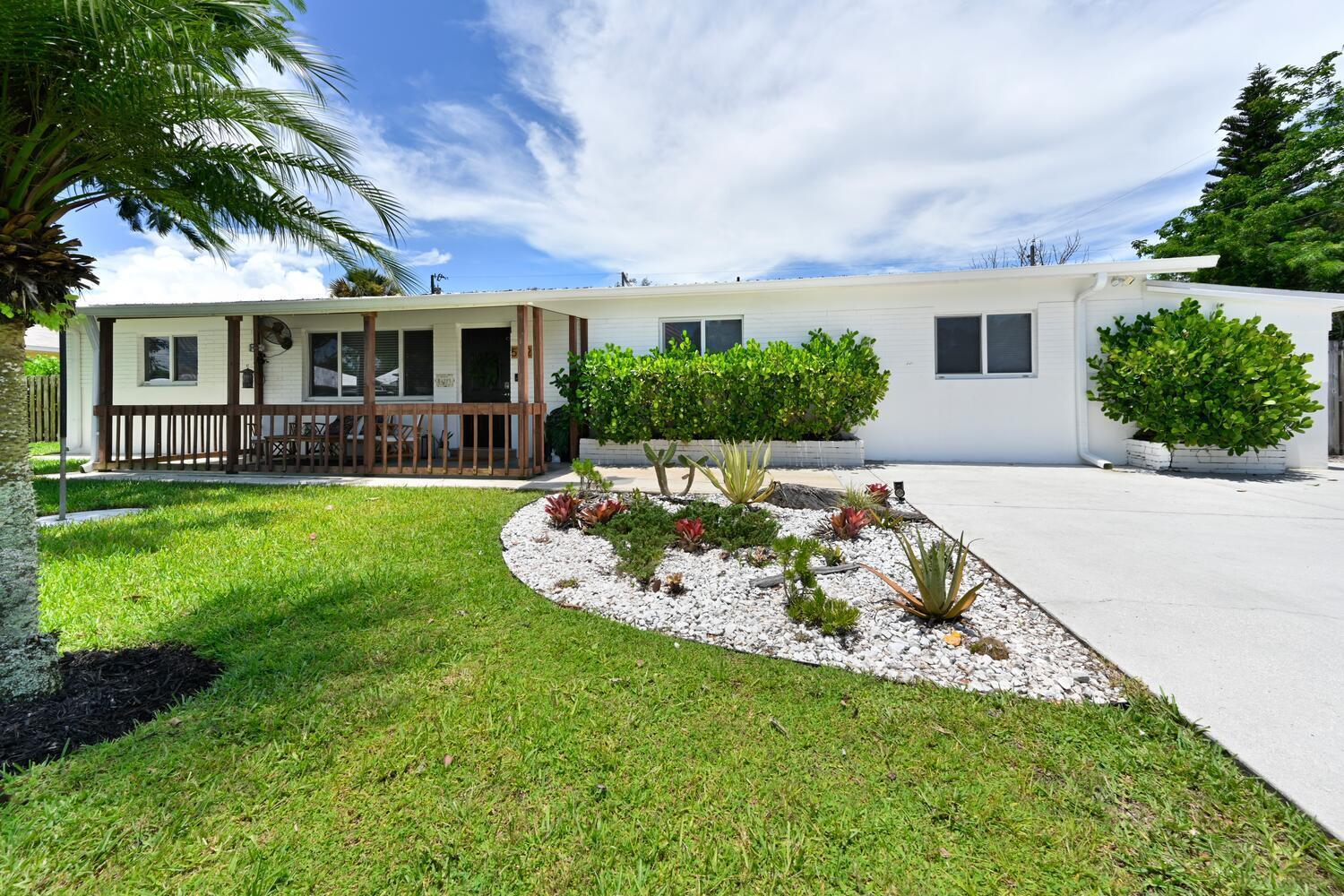 Photos coming tomorrow! Modern Meets Outdoor Living--NO HOA, Double Lot & Major Upgrades! Set on a spacious 0.32 acre double lot, this beautifully maintained 3 bed 2 bath plus DEN / office / study, high-end features and upgrades. Curb appeal shines with new sod, mango tree and privacy clusia hedges. Metal roof with third nail, impact windows, and upgraded electric panel offer peace of mind, while the new water heater and new inverter A/C unit. Inside, enjoy wood-look tile flooring, updated kitchen w/ ss appliances.The outdoors is an entertainer's dream with 18x25 tiki hut, full ring security system, irrigation, and 30x20 commercial steel building complete with triple wide driveway.Non-HOA neighborhood where you have the freedom to live your way.