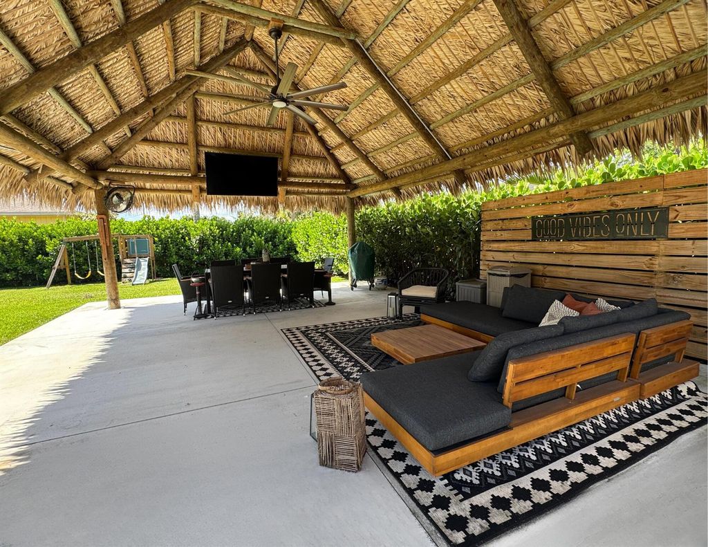 Photo of 5702 SE Laguna Avenue, Stuart, FL 34997 (MLS # R11101678)