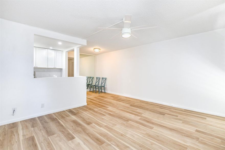 Beautifully remodeled first-floor unit filled with natural light and modern upgrades. Features a stylish kitchen with new SS appliances, durable PVC and tile flooring throughout, fresh paint, brand-new A/C wall units, updated electrical panel & wiring, high-beam kitchen lighting. The bathroom has been updated,  the home includes two new hardwired smoke detectors. Enjoy a bright, welcoming layout with direct access to a peaceful shaded courtyard, plus proximity to laundry & mail services. Great location near the cafe, club house, pool and tennis courts Resort-style community amenities include clubhouse, restaurant, multiple pools, fitness center with classes, theater, sports courts, mini golf, gardens, picnic areas, and shuttle service—offering endless activities and comfortable living.