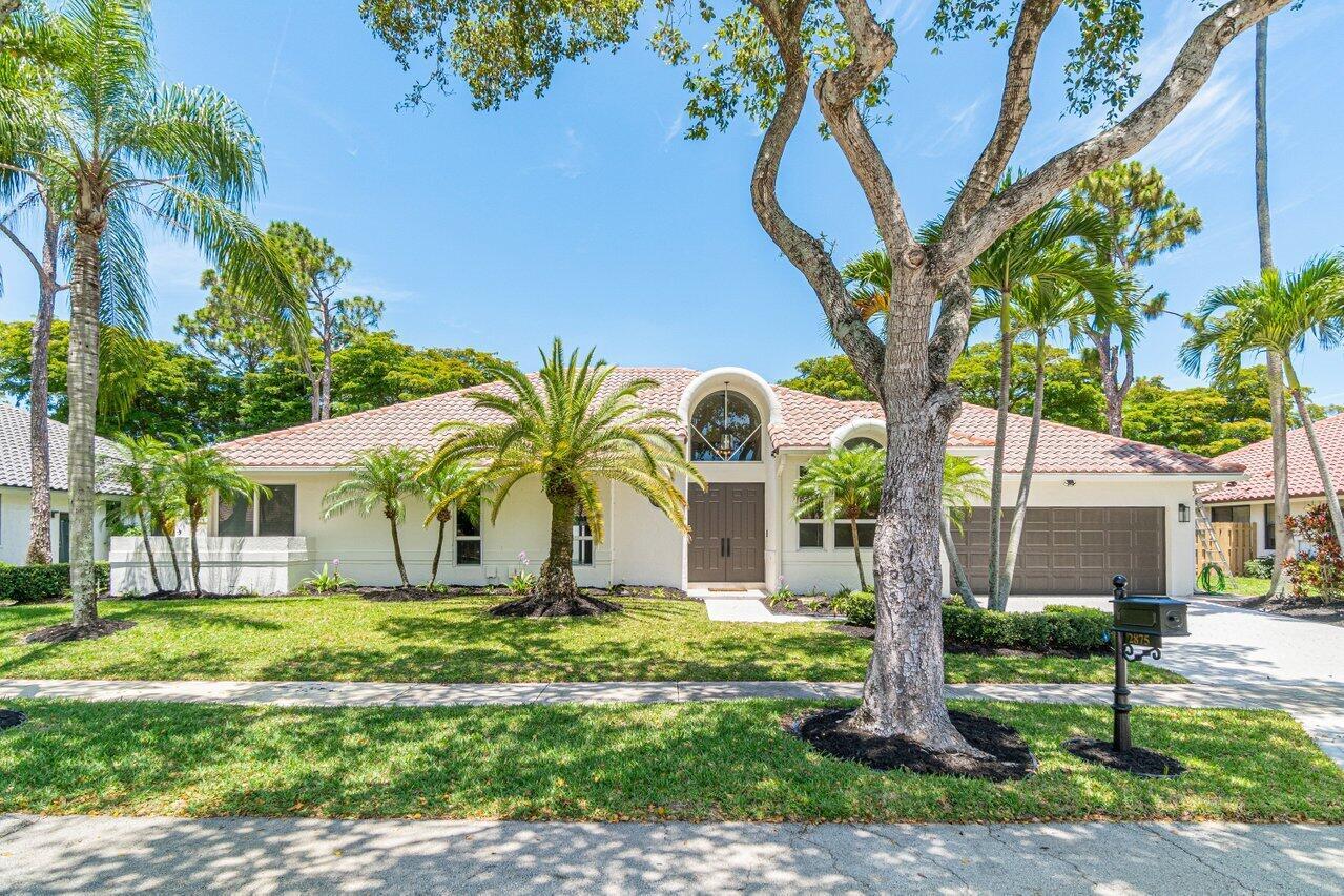 Welcome to the most desirable split floor plan in New Floresta. Surrounded by A-rated public schools and exclusive private schools in the area! Completely renovated with nothing left to spare featuring 5 bedrooms and 4 full bathrooms. Upon entering through the double front doors, a beautiful newly resurfaced pool and new travertine pool deck view awaits you. Home features marble floors in living areas with wood flooring in the bedrooms, completely remodeled kitchen, bathrooms & laundry room, high ceilings and impact windows throughout. Kitchen boasts quartz countertops with a peninsula, white custom cabinetry and backsplash. Multiple living areas and large separate dining room off kitchen for entertaining.Home has excellent curb appeal with wellkept landscaping.