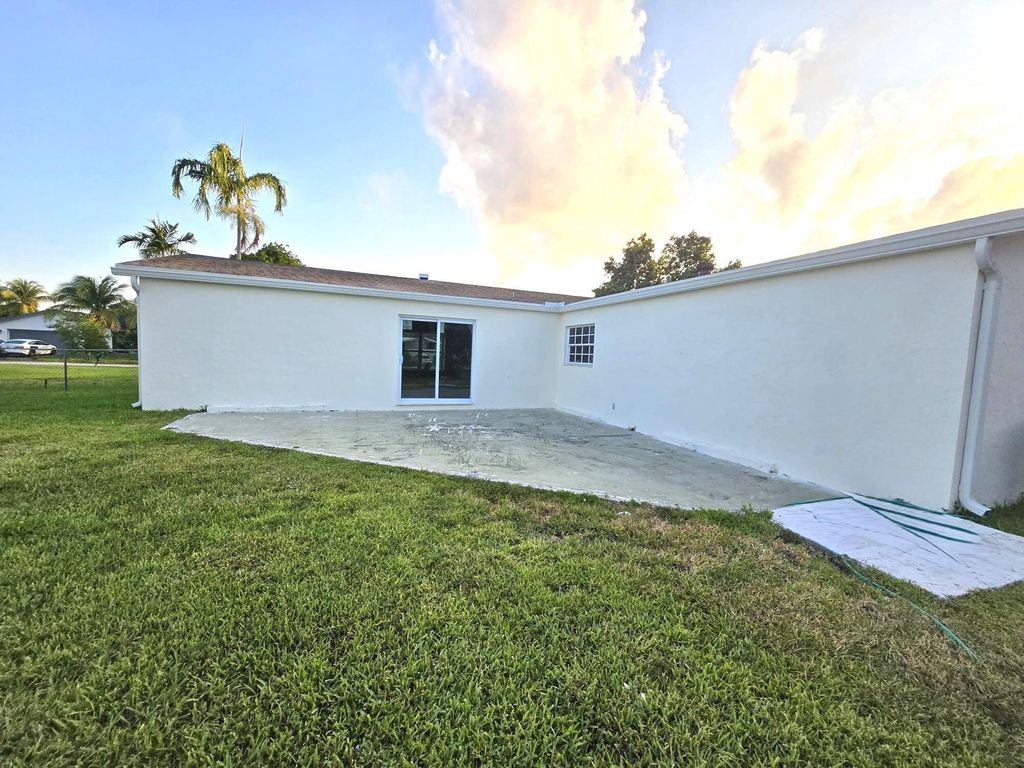 Photo of 1720 SW 13th Street, Boca Raton, FL 33486 (MLS # R10988264)