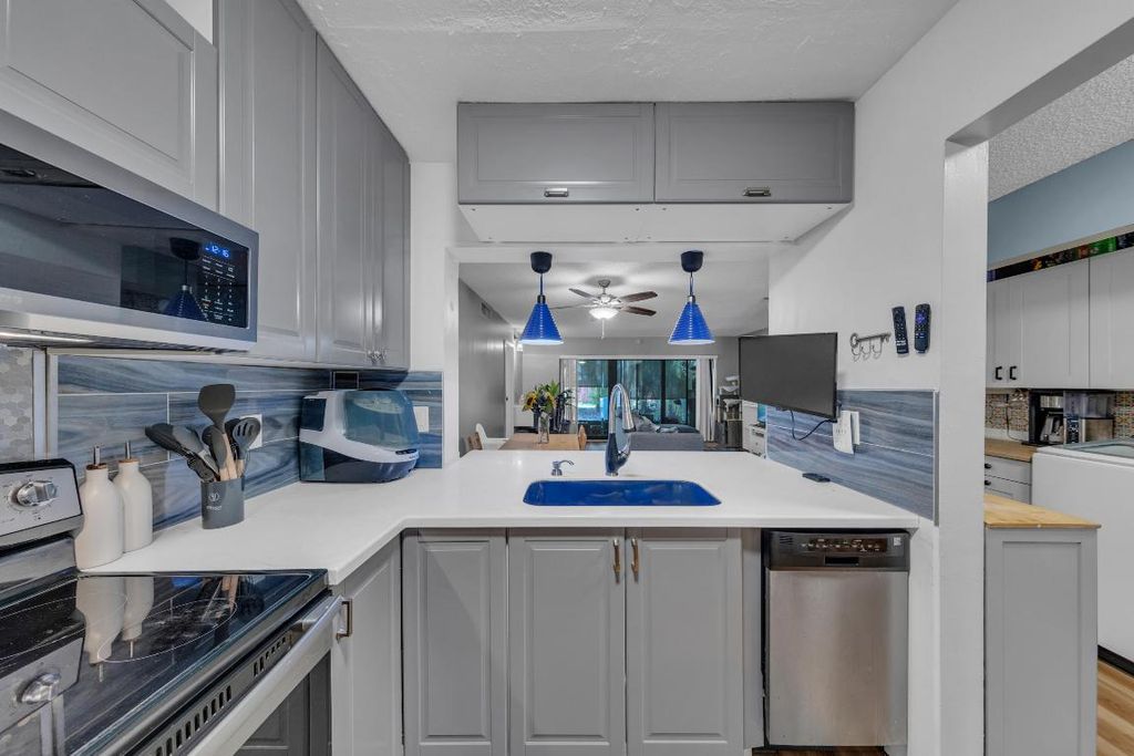 Photo of 301 N Pine Island Road #101, Plantation, FL 33324 (MLS # R11084786)