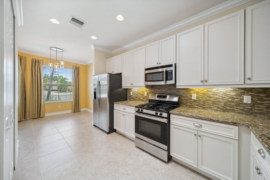 Photo of 6113 NW Castlebay Lane, Port Saint Lucie, FL 34983 (MLS # R10998454)