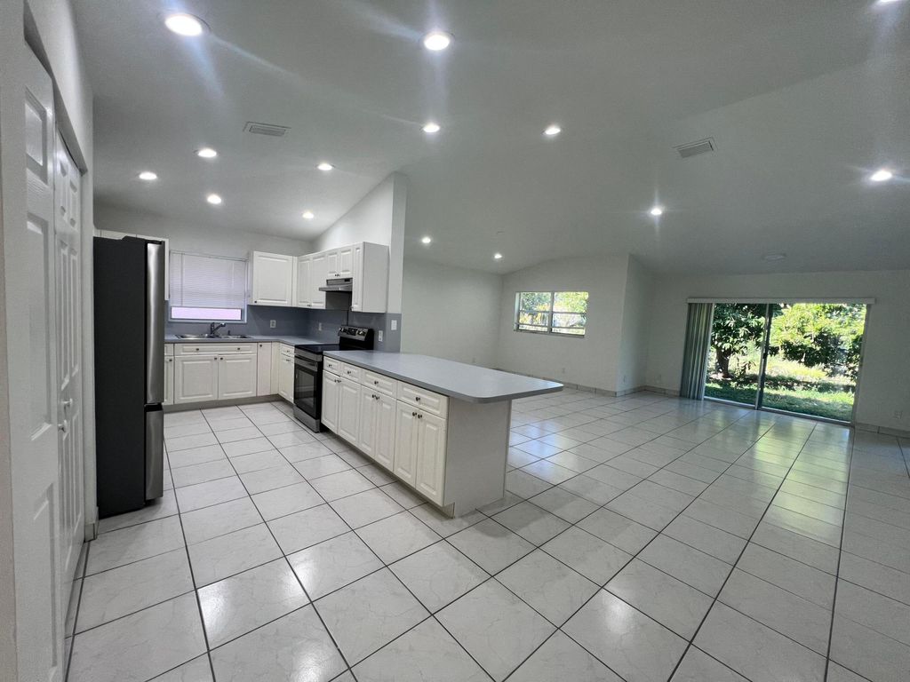 Photo of 1096 Staghorn Street, Wellington, FL 33414 (MLS # B26020480)