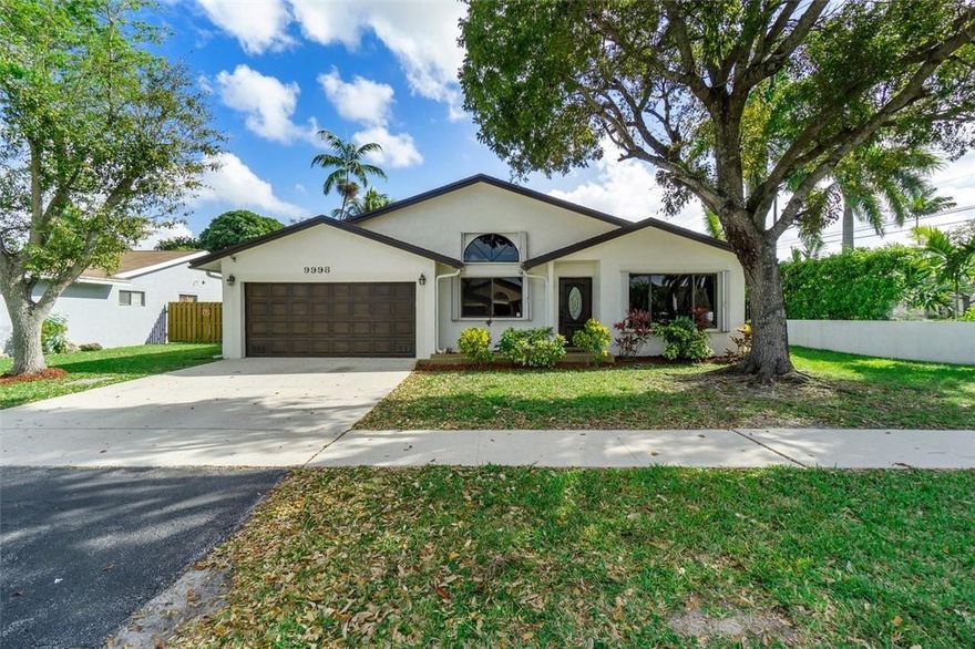 MULTIPLE OFFERS...HIGHEST AND BEST OFFERS BEING CONSIDERED UNTIL 3-14-2022 AT 12PM!  Beautiful bright, spacious updated 3 bedrooms + partially converted garage with A/C tthat can be used as a 4th Bedroom/Den/Office, 2 Baths, 2-car garage, pool home w/oversized private fenced backyard in highly sought after Parkwood in Sunrise! Home feat: Vaulted ceilings, LED high hats lighting throughout, Laminate wood flrs, upgraded bath w/ quartz counters, frameless barn-door, & LED touch mirrors, kitchen has white cabinets, granite counters, and SS appliances. Large Master with walk-in closet and French doors that lead out to open and covered pool patio area & custom pool. Roof 2007, A/C was replaced & upgraded to 5 ton July 2021, Water Heater May 2019, Accordion shutters! LOW HOA FEE $83/Month.