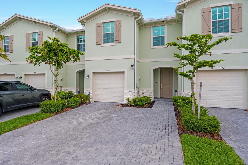 Photo of 4370 Pond Lily Lane, Lake Worth, FL 33467 (MLS # B26002267)
