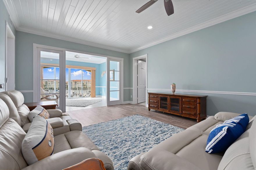 NEW PRICE! Bring an OFFER today! One of the best Harbour Isle units, perfectly positioned for full marina views and stunning sunsets. This fully upgraded 2BR/2BA waterfront residence features two private suites, including a guest suite. Ideal for entertaining or extended stays. Interior highlights include porcelain wood-look tile throughout, tongue-and-groove ceilings, recessed lighting, crown molding, ceiling fans, custom motorized blinds, and upgraded interior finishes. The gourmet kitchen offers high-end appliances and custom details. New washer and dryer included. Harbour Isle provides resort-style amenities with clubhouse, pool, fitness center, tennis, pickleball, marina access, and close proximity to beaches, downtown Fort Pierce, dining, and world-class fishing.  Move in Rea