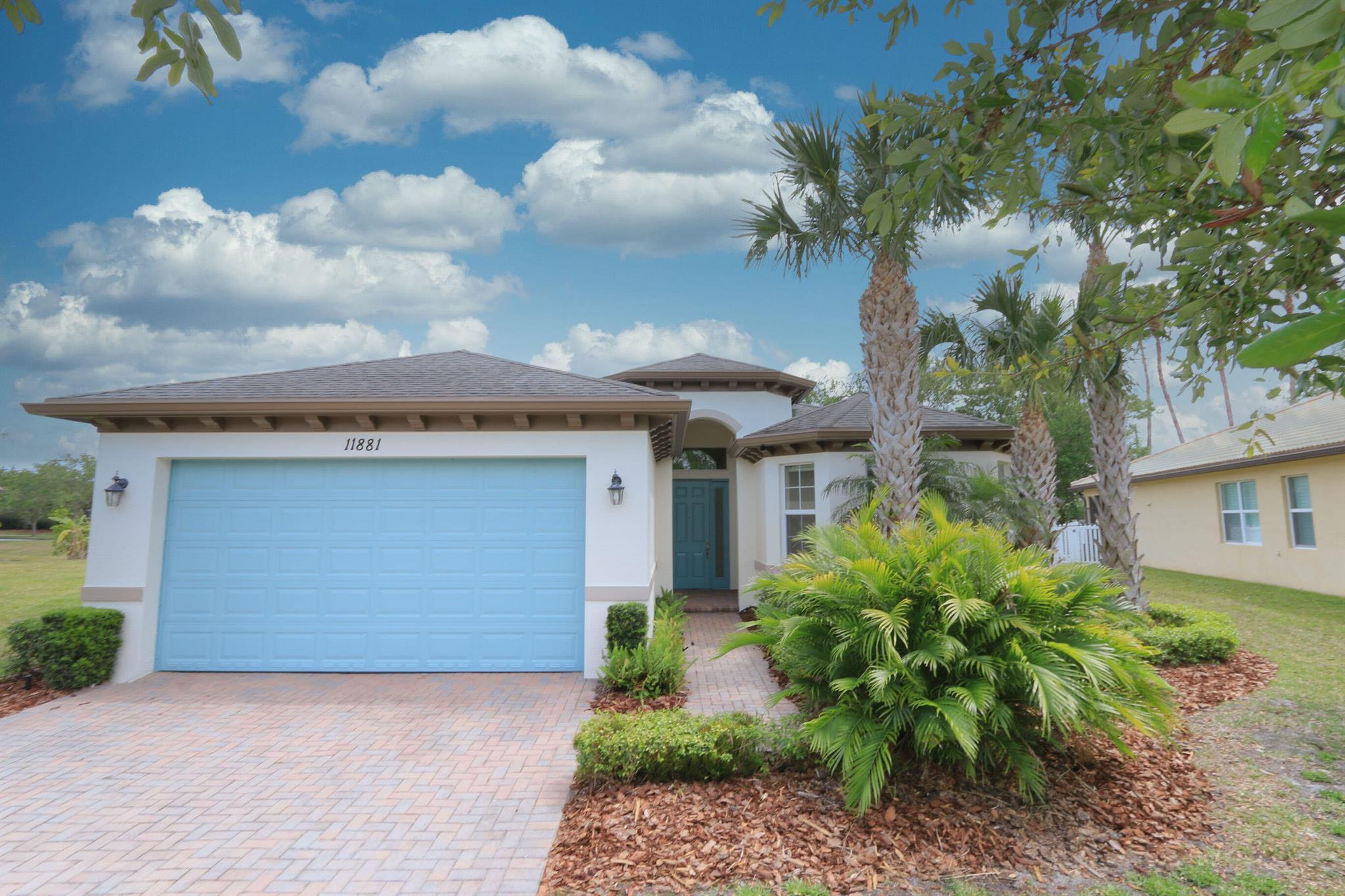 Delightfully spacious open concept and well cared for 3 bedroom 2 bath home in the Bennington area of the Town Park gated community. Peaceful and quiet neighborhood community with easy access that all Tradition has to offer, including a view of Tradition's firework shows from backyard patio. Short walk to community pool and clubhouse. Crown molding in living areas. Central vacuum. Granite counter tops. Kitchen Island, 42'' cabinetry, and ceramic tiled backsplash. Stainless steel appliances with newer LG refrigerator. Bay windows in primary and guest bedrooms. Flex room for formal dining or living room. Spacious breakfast nook within kitchen area. Brand new A/C installed 8.14.25. New water heater December 2023. Exterior of home painted in February 2025. Mature landscaping in yard!
