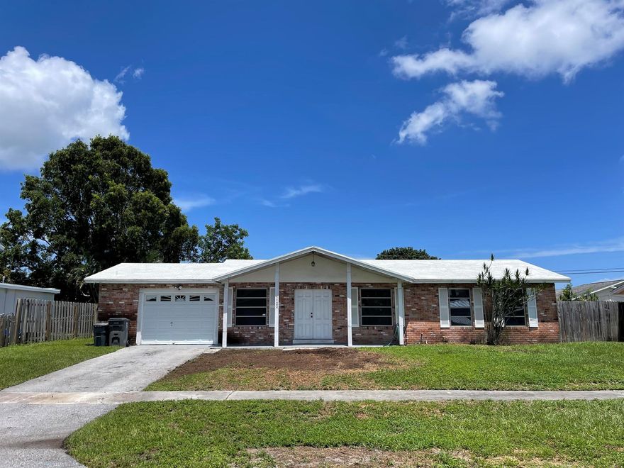 New Listing Alert!  Discover your slice of paradise in West Palm Beach! This spacious 3 bedroom, 2 bathroom single-family home boasts a large backyard, perfect for your dream pool. NEW ROOF just installed and brand new fence as well. No HOA restrictions!  Located near Palm Beach International Airport, shopping, downtown West Palm, and just 10 minutes from the beach.  This diamond in the rough offers incredible potential and is priced below market value. Calling all investors!  Whether you're looking for a lucrative rental or an Airbnb gem, this property is a golden opportunity.  Don't miss out on this hidden treasure in West Palm Beach!