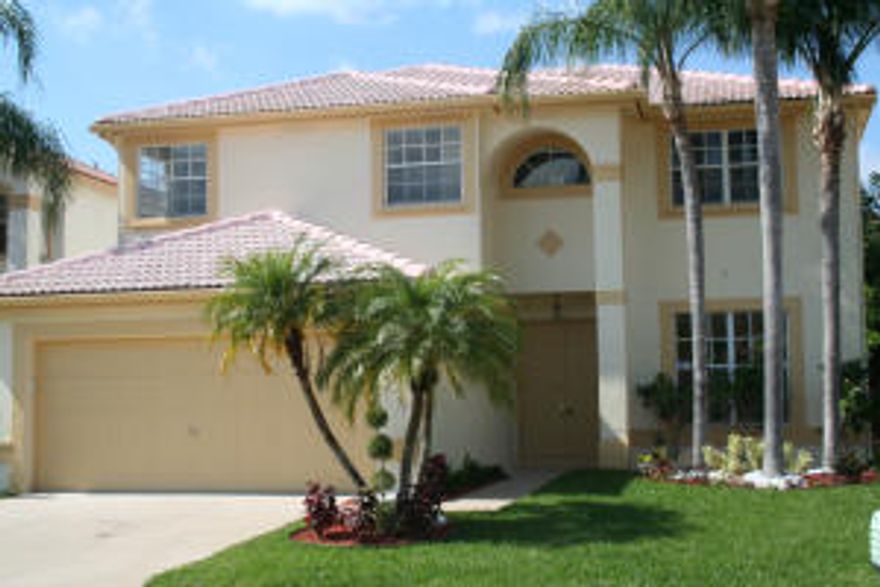 Gorgeous lakeview Pearl model, totally remodeled with the finest Designer touches. Custom kitchen with 42'' cabinets, Whirlpool stainless steel appliances, granite, added highhats and pinnacle lighting. Inviting and spacious Master Bedroom Suite has double door entry, His and Her Closets with built-ins, double Bowl Sinks with Waterfall faucets, spa tub, seamless shower and separate toilet room.  Roomy secondary bedrooms and remodeled bath also with Double Bowl Sinks and Waterfall Faucets. Home offers ceramic tile on main floor and cherry wood on stairway and 2nd floor, Knockdown on all ceilings, all new light fixtures, ceiling fans and crown molding throughout. Covered screened patio and over sized yard with lake view is perfect for entertaining. Close to schools, shopping and restaurants