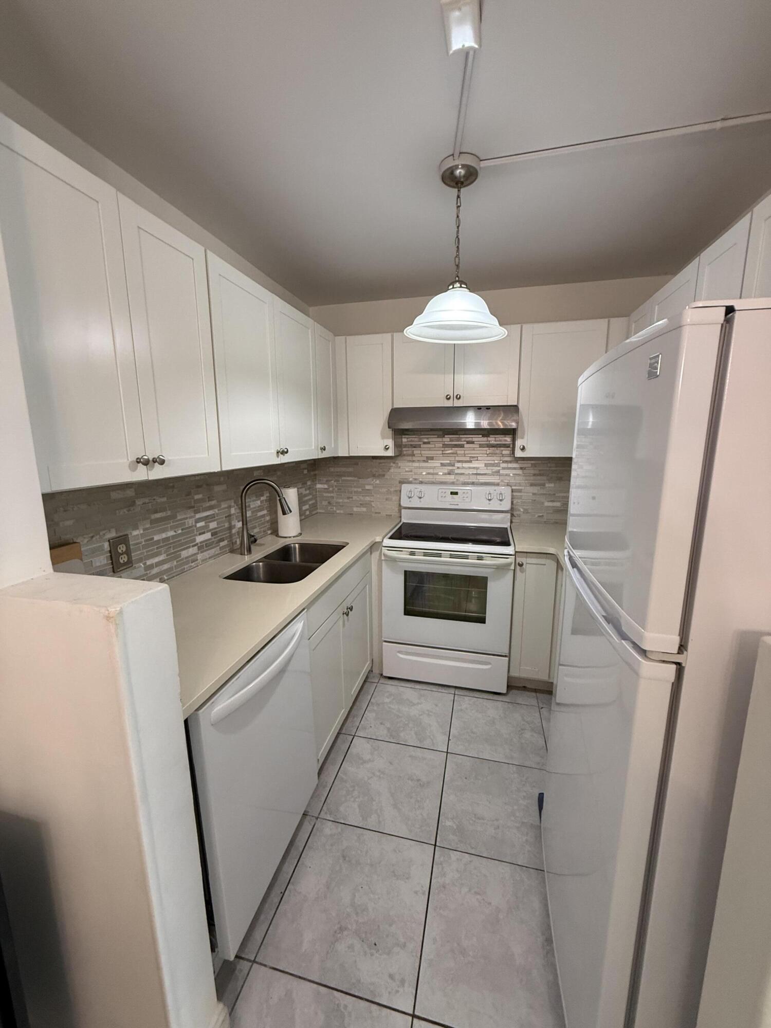 CAMBRIDGE A THRU I CONDOS - Residential Lease