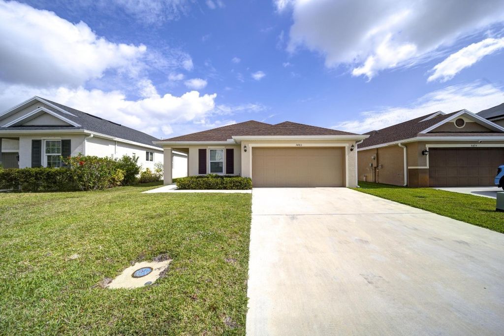 Photo of 5485 NW Pine Trail Circle, Port Saint Lucie, FL 34983 (MLS # F10499312)