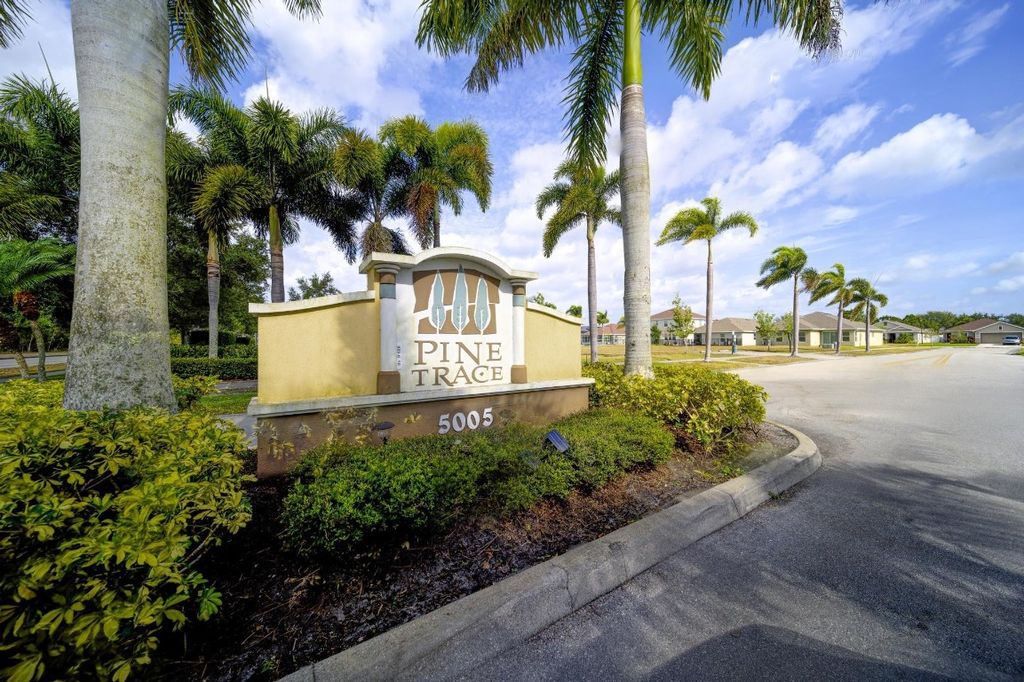 Photo of 5485 NW Pine Trail Circle, Port Saint Lucie, FL 34983 (MLS # F10499312)