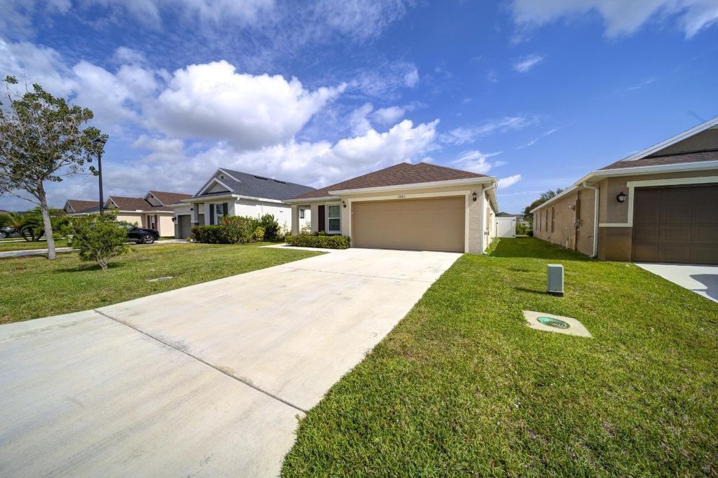 Photo of 5485 NW Pine Trail Circle, Port Saint Lucie, FL 34983 (MLS # F10499312)