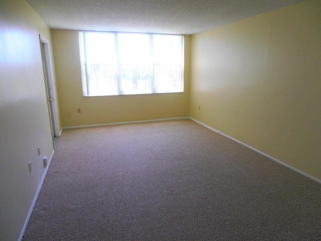 Photo of 9451 EVERGREEN Place #306, Davie, FL 33324 (MLS # B26069965)