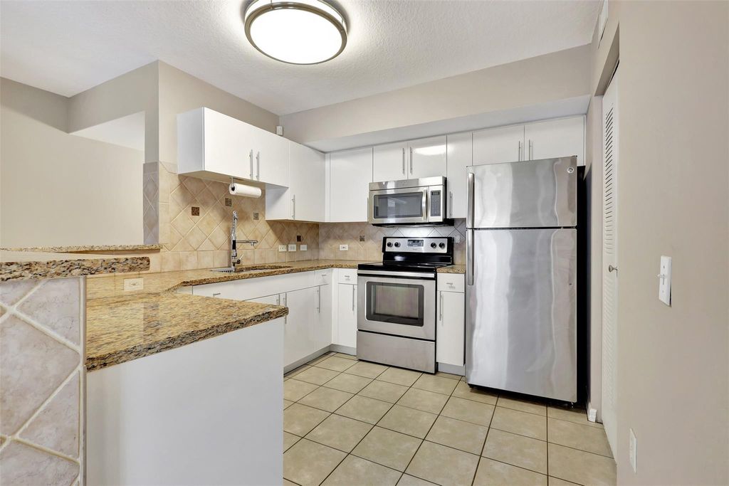 Photo of 310 Villa Circle #310, Boynton Beach, FL 33435 (MLS # B26013238)
