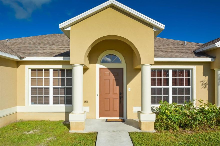 Charming CBS home built in 2008. This 3/2/2 with its spacious open floor plan has vaulted ceilings with tile throughout. The split floor plan also has a formal dining area, bonus living area or office, kitchen filled with upgrades including SS appliances, granite, custom cabinetry with tons of space. The large bedrooms and open floor plan make this home great for big families and entertaining. Centrally located, just blocks away from shops and schools.