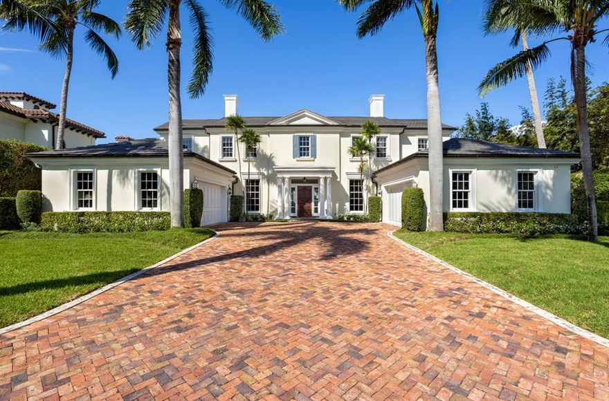 Classic elegance reaches the height of refined sophistication in this Palm Beach Georgian-inspired residence on the Intracoastal Waterway, minutes from the ocean and The Boca Raton club.  Completed in late 2006, this exquisitely appointed residence was an original collaboration of premier luxury homebuilder Mark Timothy, Inc., noted architect Thomas Kirchhoff.

Warmly inviting and flawlessly functional, the spacious living areas flow seamlessly off of the stately marble reception hall.  Glass doors wrapping around the full waterfront exposure open the entire main floor to refreshing breezes while transitioning the interiors to the outdoors through loggias with an open-air fireplace. Swaying coconut palm trees frame the serene pool patio positioned directly along the alluring tropical waterfront.  Hosting indoor/outdoor entertaining in the quintessence of tasteful luxury, this is an exceptional residence in the Estates Section, known as the Jewel in the Crown of Boca Raton.  

Location

Spanish River Road, Boca Raton, Florida.  Known as the jewel in the crown of Boca Raton, the Estate Section combines a premier locale and a rich heritage in one of Florida's finest beachside enclaves. Established in the 1930s, this exclusive neighborhood captures a timeless setting with stately residences in a lush landscape with century-old pines and towering palms.


Property

This Tropical Georgian-style estate capitalizes on lushly tranquil scenery along 100± feet of Intracoastal Waterway shoreline.  Three breezy loggias stretching across the waterfront façade create a series of intimate outdoor living spaces adorned with cypress ceilings, crisp white draperies, a wood-burning fireplace, and summer kitchen.  Velvet lawns edge the beautiful coquina patio inset with a sleek pool and spa, just above the waterfront's concrete dock. 

Residence

Classic architectural design and elegant décor are artfully composed in this stately residence offering 11,160± total square feet with 5 bedrooms, 6 full and 2 half baths, and 4-car garage.  Special features include the 200-bottle wine room, elevator, back-up generator, and impact-resistant windows and glass doors.  

First Floor:  An entry gallery welcomes guests into the dramatic 2-story reception hall where black-and-beige marble floors set off the impressive grand staircase.  Waterway views are framed through the elegant living room with hand-scraped walnut floors, elaborate ceiling moldings, and glass doors that open to the main loggia in an excellent flow for entertaining.  The formal dining room is refined with upholstered walls above the raised-panel wainscoting and herringbone-patterned walnut floors.  Stylishly functional, the epicurean's kitchen features Golden Dream marble floors, granite counters, a teak-topped island, Sub-Zero refrigerator/freezer, Miele dishwasher, Viking range, and GE Monogram ovens.  A full-service butler's pantry and laundry/utility room adjoin.  A charming breakfast room with cross-beamed cypress ceiling leads into the family room with wood-beamed raffia ceiling treatments, media center, and glass doors on 2 exposures opening to waterfront loggias.  Off the reception hall, the beautiful library showcases hand-crafted maple paneling, floor-to-ceiling built-ins, a marble-faced fireplace, and intricate ceiling moldings.  Its full-service bar also opens to the waterfront billiard room with walnut floor, wainscoting, and glass doors leading to loggias on 2 sides.  A powder room, cabana bath, and private guest suite complete this level.         

Second Floor:  The grand master suite is ensconced in an enormous private wing occupying half the upper level and opens onto a covered terrace and sun deck overlooking the picturesque Intracoastal Waterway.  The capacious master bedroom with tray ceiling is accompanied by a sitting room with art glass interior wall, room-sized closets, and sumptuous his-and-her spa-style baths lavished with exotic marble.  Three more luxurious bedroom suites include one with private waterside deck. 

DISCLAIMER: Information published or otherwise provided by the listing company and its representatives including but not limited to prices, measurements, square footages, lot sizes, calculations, statistics, and videos are deemed reliable but are not guaranteed and are subject to errors, omissions or changes without notice. All such information should be independently verified by any prospective purchaser or seller. Parties should perform their own due diligence to verify such information prior to a sale or listing. Listing company expressly disclaims any warranty or representation regarding such information. Prices published are either list price, sold price, and/or last asking price. The listing company participates in the Multiple Listing Service and IDX. The properties published as listed and sold are not necessarily exclusive to listing company and may be listed or have sold with other members of the Multiple Listing Service. Transactions where listing company represented both buyers and sellers are calculated as two sales. The listing company's marketplace is all of the following: Vero Beach, Town of Orchid, Indian River Shores, Town of Palm Beach, West Palm Beach, Manalapan Beach, Point Manalapan, Hypoluxo Island, Ocean Ridge, Gulf Stream, Delray Beach, Highland Beach, Boca Raton, East Deerfield Beach, Hillsboro Beach, Hillsboro Shores, East Pompano Beach, Lighthouse Point, Sea Ranch Lakes and Fort Lauderdale. Cooperating brokers are advised that in the event of a Buyer default, no fee will be paid to a cooperating Broker on the Deposits retained by the Seller. No fees are paid to any cooperating broker until title passes or upon actual commencement of a lease. Some affiliations may not be applicable to certain geographic areas. If your property is currently listed with another broker, please disregard any solicitation for services. Copyright 2022 by the listing company. All Rights Reserved.