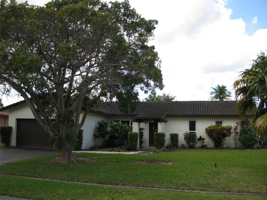 Photo of 12226 NW 31st Drive, Coral Springs, FL 33065 (MLS # F10489016)