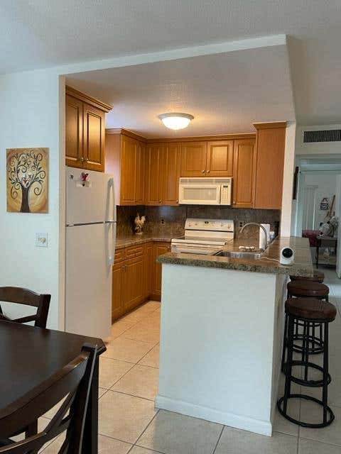Photo of 348 Monaco H #348, Delray Beach, FL 33446 (MLS # R11109923)