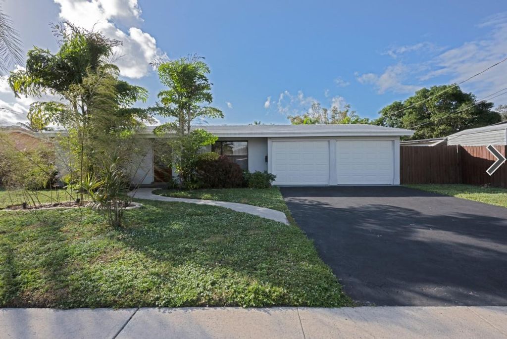 Photo of 1311 SW 56th Avenue, Plantation, FL 33317 (MLS # B26003377)