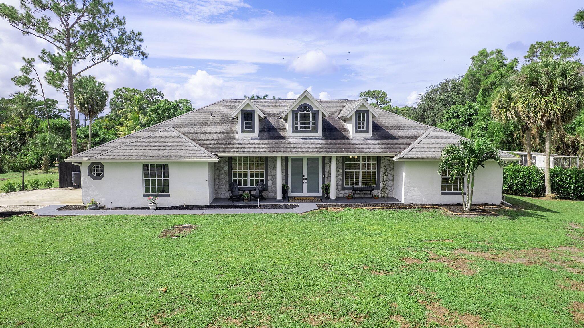 Modern farmhouse charm meets country living on this stunning 1.15-acre ranch-style property. Featuring 4 bedrooms + Den, 2 bathrooms, and a 2-car garage, this home offers a bright, open layout designed for comfort, functionality, and everyday enjoyment.Inside, you'll love the light-filled living area with an easy flow from room to room. A whole house reverse osmosis water system filters, including outdoor hose Your private backyard oasis with in-ground saltwater pool is surrounded by a travertine tile deck and a custom-built wooden gazebo (2024), perfect for relaxing or entertaining. The outdoor kitchen includes a Bull grill, two burners, and a large flat-top griddle