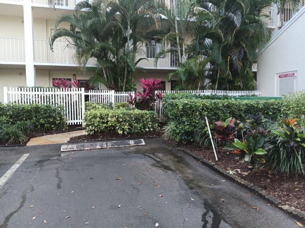 Photo of 7290 Ashford Place #104, Delray Beach, FL 33446 (MLS # R10860140)